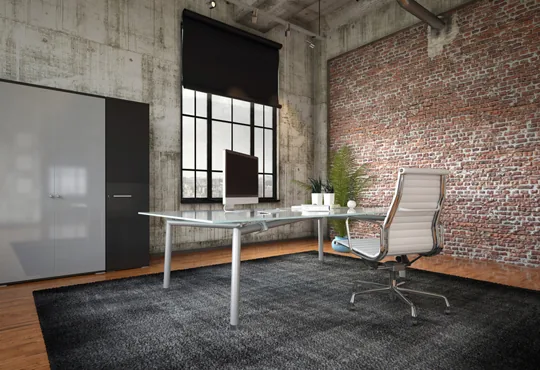 Modern office interior with textured brick wall finish